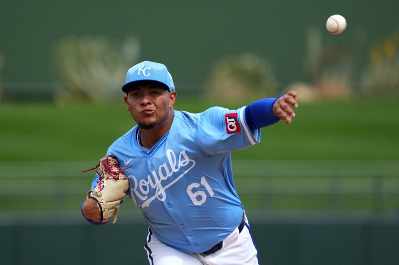 Mar 6, 2024; Surprise, Arizona, USA; Kansas City Royals starting pitcher Angel Zerpa (61) pitches against the Seattle Mariners during the first inning at Surprise Stadium. Mandatory Credit: Joe Camporeale-USA TODAY Sports