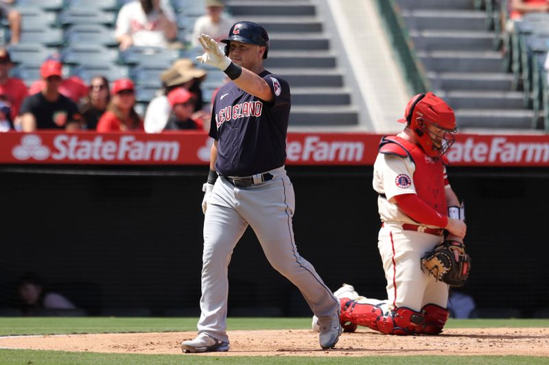 Sep 10, 2023; Anaheim, California, USA; Cleveland Guardians right fielder Kole Calhoun (56) celebrates after hitting a home run against the Los Angeles Angels during the second inning of the game  at Angel Stadium. Mandatory Credit: Jessica Alcheh-USA TODAY Sports