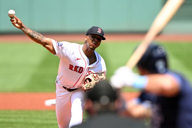 Jul 13, 2025; Boston, Massachusetts, USA; Boston Red Sox pitcher Brayan Bello (66) pitches against the Tampa Bay Rays during the first inning  at Fenway Park. Mandatory Credit: Brian Fluharty-Imagn Images