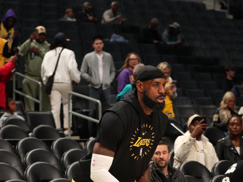 CHARLOTTE, NC - JANUARY 27:  LeBron James #23 of the Los Angeles Lakers warms up before the game against the Charlotte Hornets on January 27, 2025 at Spectrum Center in Charlotte, North Carolina. NOTE TO USER: User expressly acknowledges and agrees that, by downloading and or using this photograph, User is consenting to the terms and conditions of the Getty Images License Agreement. Mandatory Copyright Notice: Copyright 2025 NBAE (Photo by Kent Smith/NBAE via Getty Images)