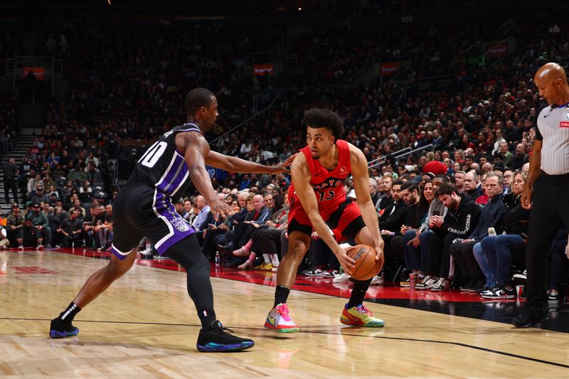 TORONTO, CANADA - MARCH 20: Jordan Nwora #13 of the Toronto Raptors dribbles the ball during the game against the Sacramento Kings on March 20, 2024 at the Scotiabank Arena in Toronto, Ontario, Canada.  NOTE TO USER: User expressly acknowledges and agrees that, by downloading and or using this Photograph, user is consenting to the terms and conditions of the Getty Images License Agreement.  Mandatory Copyright Notice: Copyright 2024 NBAE (Photo by Vaughn Ridley/NBAE via Getty Images)