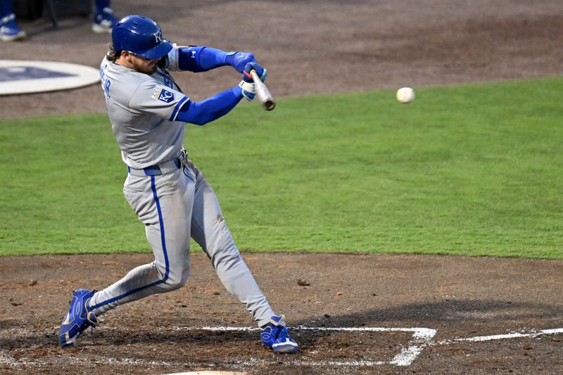Apr 30, 2025; St. Petersburg, Florida, USA; Kansas City Royals shortstop Bobby Witt Jr. (7) hits a RBI single in the fifth inning against the Tampa Bay Rays at George M. Steinbrenner Field. Mandatory Credit: Jonathan Dyer-Imagn Images