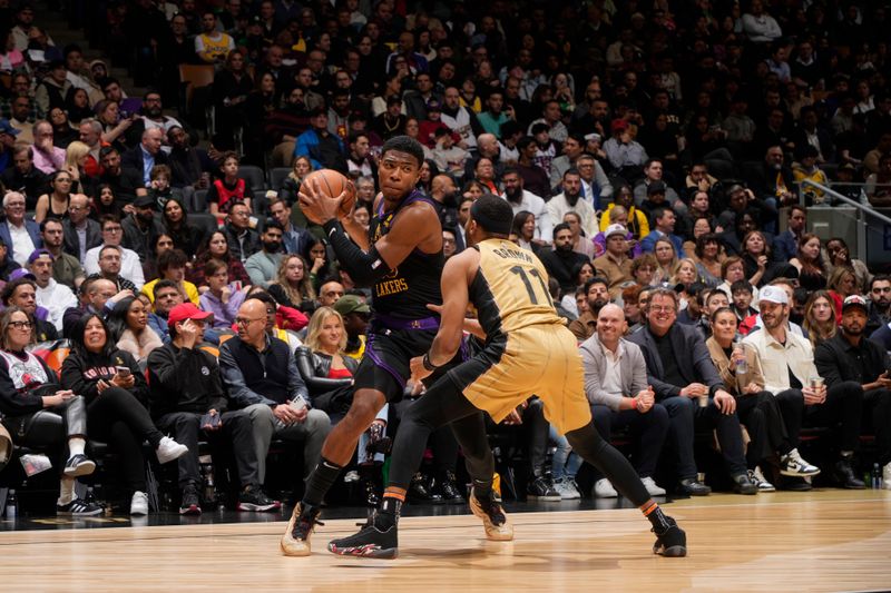 TORONTO, CANADA - APRIL 2: Rui Hachimura #28 of the Los Angeles Lakers handles the ball during the game against the Toronto Raptors on April 2, 2024 at the Scotiabank Arena in Toronto, Ontario, Canada.  NOTE TO USER: User expressly acknowledges and agrees that, by downloading and or using this Photograph, user is consenting to the terms and conditions of the Getty Images License Agreement.  Mandatory Copyright Notice: Copyright 2024 NBAE (Photo by Mark Blinch/NBAE via Getty Images)