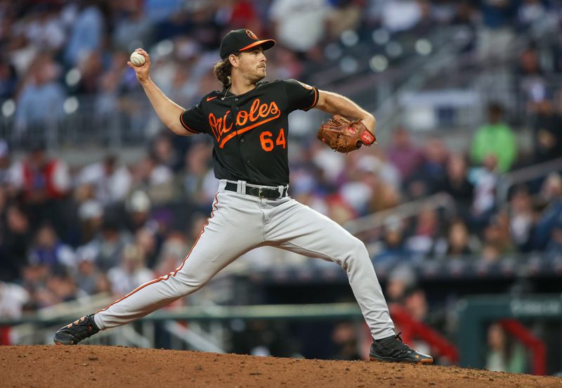 May 5, 2023; Atlanta, Georgia, USA; Baltimore Orioles starting pitcher Dean Kremer (64) throws against the Atlanta Braves in the fourth inning at Truist Park. Mandatory Credit: Brett Davis-USA TODAY Sports