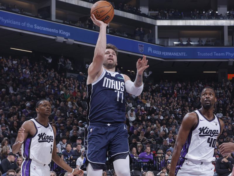 SACRAMENTO, CA - MARCH 29:  Luka Doncic #77 of the Dallas Mavericks goes to the basket during the game on March 29, 2024 at Golden 1 Center in Sacramento, California. NOTE TO USER: User expressly acknowledges and agrees that, by downloading and or using this Photograph, user is consenting to the terms and conditions of the Getty Images License Agreement. Mandatory Copyright Notice: Copyright 2024 NBAE (Photo by Rocky Widner/NBAE via Getty Images)