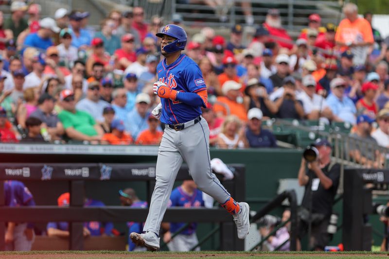 Mar 1, 2024; Jupiter, Florida, USA; New York Mets third baseman Mark Vientos (27) circles the bases after hitting a home run against the St. Louis Cardinals during the second inning at Roger Dean Chevrolet Stadium. Mandatory Credit: Sam Navarro-USA TODAY Sports