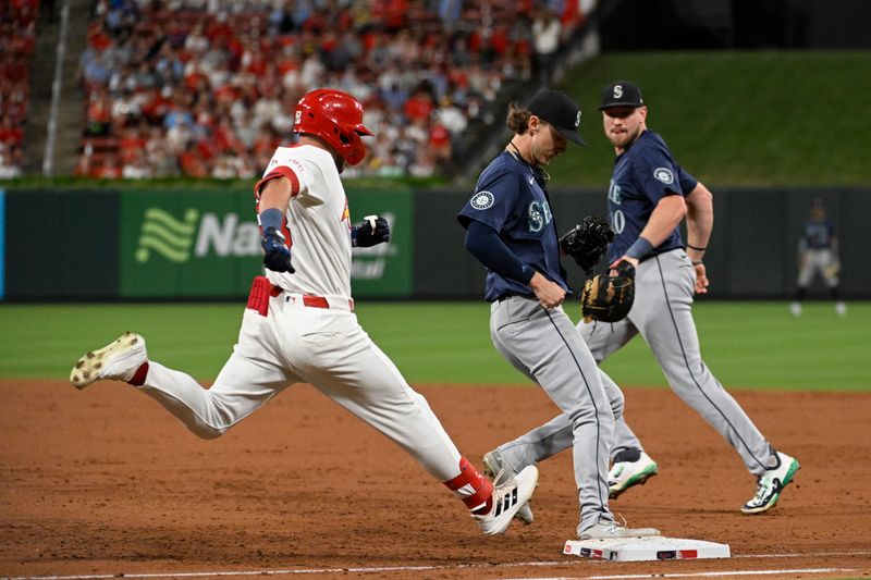 Sep 6, 2024; St. Louis, Missouri, USA; Seattle Mariners starting pitcher Bryce Miller (50) forces out St. Louis Cardinals center fielder Michael Siani (63) at first base in the third inning at Busch Stadium. Mandatory Credit: Joe Puetz-Imagn Images