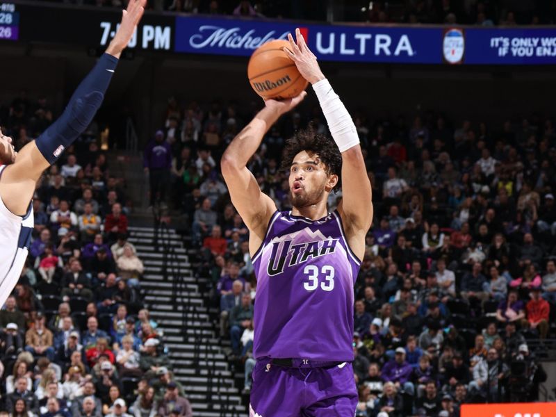 SALT LAKE CITY, UT - MARCH 4:  Johnny Juzang #33 of the Utah Jazz shoots a three point basket during the game against the Washington Wizards on March 4, 2024 at vivint.SmartHome Arena in Salt Lake City, Utah. NOTE TO USER: User expressly acknowledges and agrees that, by downloading and or using this Photograph, User is consenting to the terms and conditions of the Getty Images License Agreement. Mandatory Copyright Notice: Copyright 2024 NBAE (Photo by Melissa Majchrzak/NBAE via Getty Images)