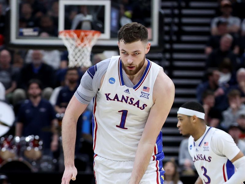 Mar 23, 2024; Salt Lake City, UT, USA; Kansas Jayhawks center Hunter Dickinson (1) reacts after a basket during the first half in the second round of the 2024 NCAA Tournament at Vivint Smart Home Arena-Delta Center. Mandatory Credit: Rob Gray-USA TODAY Sports