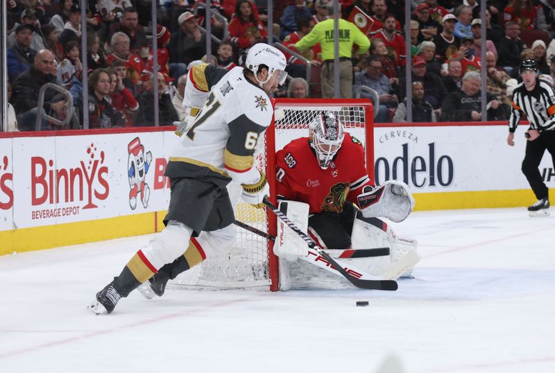 Jan 4, 2026; Chicago, Illinois, USA; Vegas Golden Knights right wing Mark Stone (61) attempts a shot on goal past Chicago Blackhawks goaltender Arvid Soderblom (40) during the second period at United Center. Mandatory Credit: Talia Sprague-Imagn Images