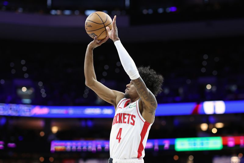 PHILADELPHIA, PENNSYLVANIA - JANUARY 15: Jalen Green #4 of the Houston Rockets shoots a jump shot during the first quarter against the Philadelphia 76ers at the Wells Fargo Center on January 15, 2024 in Philadelphia, Pennsylvania. NOTE TO USER: User expressly acknowledges and agrees that, by downloading and or using this photograph, User is consenting to the terms and conditions of the Getty Images License Agreement. (Photo by Tim Nwachukwu/Getty Images)