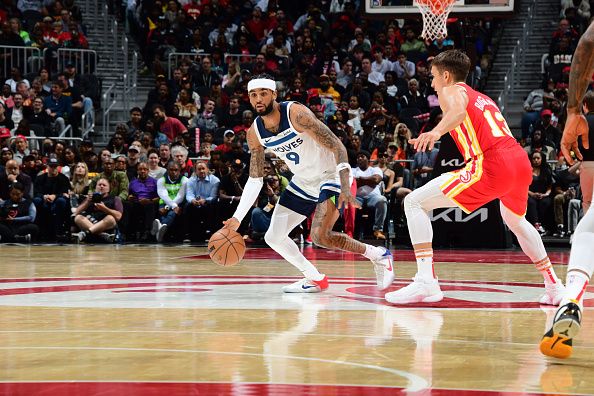 ATLANTA, GA - OCTOBER 30: Nickeil Alexander-Walker #9 of the Minnesota Timberwolves brings the ball up court against the Atlanta Hawks on October 30, 2023 at State Farm Arena in Atlanta, Georgia.  NOTE TO USER: User expressly acknowledges and agrees that, by downloading and/or using this Photograph, user is consenting to the terms and conditions of the Getty Images License Agreement. Mandatory Copyright Notice: Copyright 2023 NBAE (Photo by Scott Cunningham/NBAE via Getty Images)