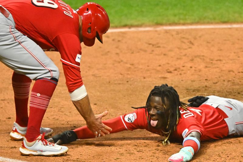 Sep 26, 2023; Cleveland, Ohio, USA; Cincinnati Reds shortstop Elly De La Cruz (44) reacts after scoring in the fifth inning against the Cleveland Guardians at Progressive Field. Mandatory Credit: David Richard-USA TODAY Sports