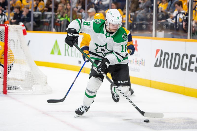 Feb 15, 2024; Nashville, Tennessee, USA; Dallas Stars center Sam Steel (18) skates with the puck  against the Nashville Predators during the second period at Bridgestone Arena. Mandatory Credit: Steve Roberts-USA TODAY Sports