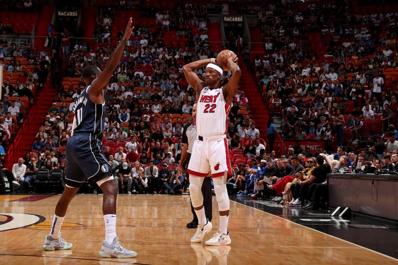 MIAMI, FL - APRIL 1: Jimmy Butler #22 of the Miami Heat looks to pass the ball during the game during the game against the Dallas Mavericks on April 1, 2023 at Miami-Dade Arena in Miami, Florida. NOTE TO USER: User expressly acknowledges and agrees that, by downloading and or using this Photograph, user is consenting to the terms and conditions of the Getty Images License Agreement. Mandatory Copyright Notice: Copyright 2023 NBAE (Photo by Issac Baldizon/NBAE via Getty Images)