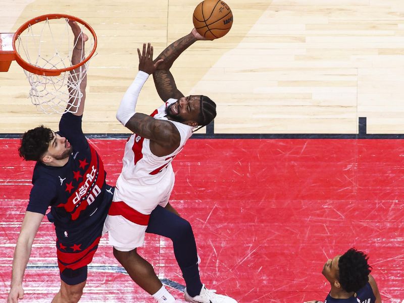 TORONTO, CANADA - MARCH 10: Jamal Shead #23 of the Toronto Raptors shoots the ball during the game against the Washington Wizards  on March 10, 2025 at the Scotiabank Arena in Toronto, Ontario, Canada.  NOTE TO USER: User expressly acknowledges and agrees that, by downloading and or using this Photograph, user is consenting to the terms and conditions of the Getty Images License Agreement.  Mandatory Copyright Notice: Copyright 2025 NBAE (Photo by Vaughn Ridley/NBAE via Getty Images)