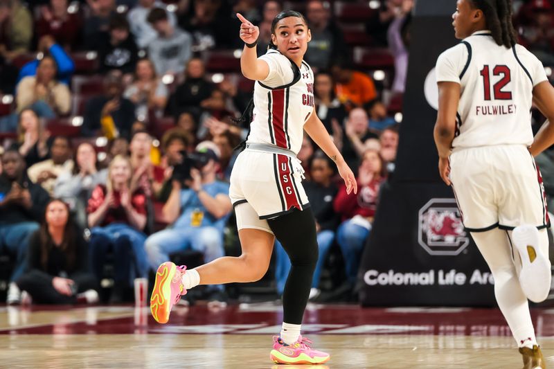 Feb 22, 2024; Columbia, South Carolina, USA; South Carolina Gamecocks guard Te-Hina Paopao (0) celebrates a three point basket against the Alabama Crimson Tide in the first half at Colonial Life Arena. Mandatory Credit: Jeff Blake-USA TODAY Sports