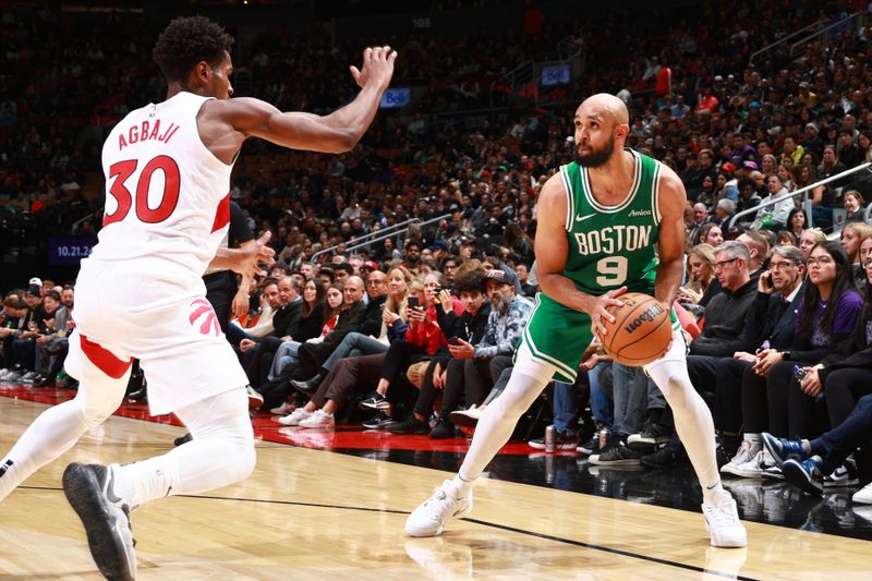 TORONTO, CANADA - OCTOBER 15: Derrick White #9 of the Boston Celtics handles the ball during the game against the Toronto Raptors on October 15, 2024 at the Scotiabank Arena in Toronto, Ontario, Canada.  NOTE TO USER: User expressly acknowledges and agrees that, by downloading and or using this Photograph, user is consenting to the terms and conditions of the Getty Images License Agreement.  Mandatory Copyright Notice: Copyright 2024 NBAE (Photo by Vaughn Ridley/NBAE via Getty Images)