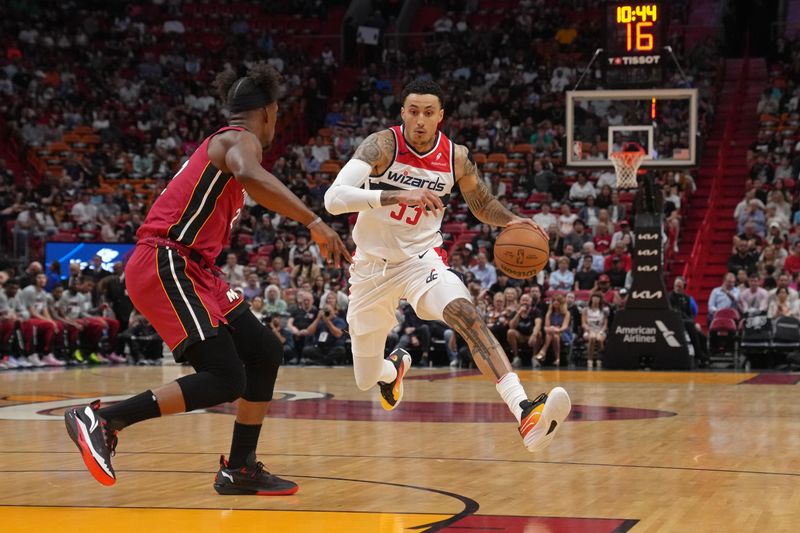 MIAMI, FL - MARCH 10: Kyle Kuzma #33 of the Washington Wizards handles the ball during the game against the Miami Heat on March 10, 2024 at Kaseya Center in Miami, Florida. NOTE TO USER: User expressly acknowledges and agrees that, by downloading and or using this Photograph, user is consenting to the terms and conditions of the Getty Images License Agreement. Mandatory Copyright Notice: Copyright 2024 NBAE (Photo by Eric Espada/NBAE via Getty Images)