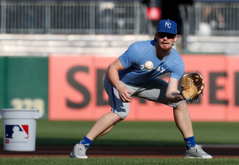 Sep 13, 2024; Pittsburgh, Pennsylvania, USA;  Kansas City Royals shortstop Bobby Witt Jr. (7) takes ground balls before a game against the Pittsburgh Pirates at PNC Park. Mandatory Credit: Charles LeClaire-Imagn Images