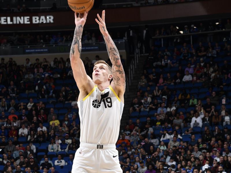 ORLANDO, FL - FEBRUARY 29: Luka Samanic #19 of the Utah Jazz shoots the ball during the game against the Orlando Magic on February 29, 2024 at Amway Center in Orlando, Florida. NOTE TO USER: User expressly acknowledges and agrees that, by downloading and or using this photograph, User is consenting to the terms and conditions of the Getty Images License Agreement. Mandatory Copyright Notice: Copyright 2024 NBAE (Photo by Fernando Medina/NBAE via Getty Images)