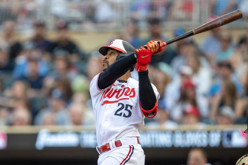 May 23, 2023; Minneapolis, Minnesota, USA; Minnesota Twins designated hitter Byron Buxton (25) hits a two run home run in the first inning against the San Francisco Giants at Target Field. Mandatory Credit: Jesse Johnson-USA TODAY Sports