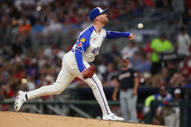 Aug 24, 2024; Atlanta, Georgia, USA; Atlanta Braves relief pitcher Aaron Bummer (49) throws against the Washington Nationals in the sixth inning at Truist Park. Mandatory Credit: Brett Davis-USA TODAY Sports
