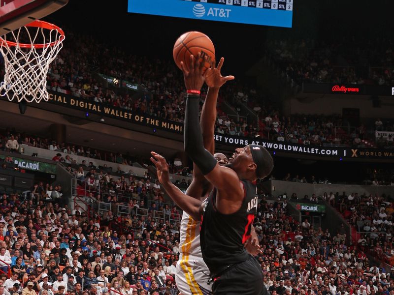 MIAMI, FL - MARCH 26: Bam Adebayo #13 of the Miami Heat shoots the ball during the game against the Golden State Warriors  on March 26, 2024 at Kaseya Center in Miami, Florida. NOTE TO USER: User expressly acknowledges and agrees that, by downloading and or using this Photograph, user is consenting to the terms and conditions of the Getty Images License Agreement. Mandatory Copyright Notice: Copyright 2024 NBAE (Photo by Issac Baldizon/NBAE via Getty Images)