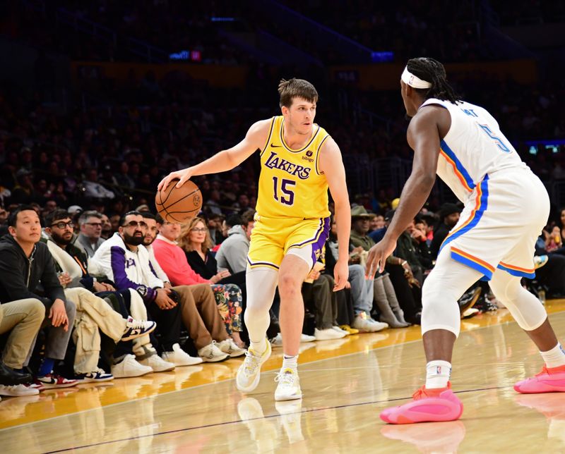 LOS ANGELES, CA - MARCH 4: Austin Reaves #15 of the Los Angeles Lakers dribbles the ball during the game against the Oklahoma City Thunder on March 4, 2024 at Crypto.Com Arena in Los Angeles, California. NOTE TO USER: User expressly acknowledges and agrees that, by downloading and/or using this Photograph, user is consenting to the terms and conditions of the Getty Images License Agreement. Mandatory Copyright Notice: Copyright 2024 NBAE (Photo by Adam Pantozzi/NBAE via Getty Images)