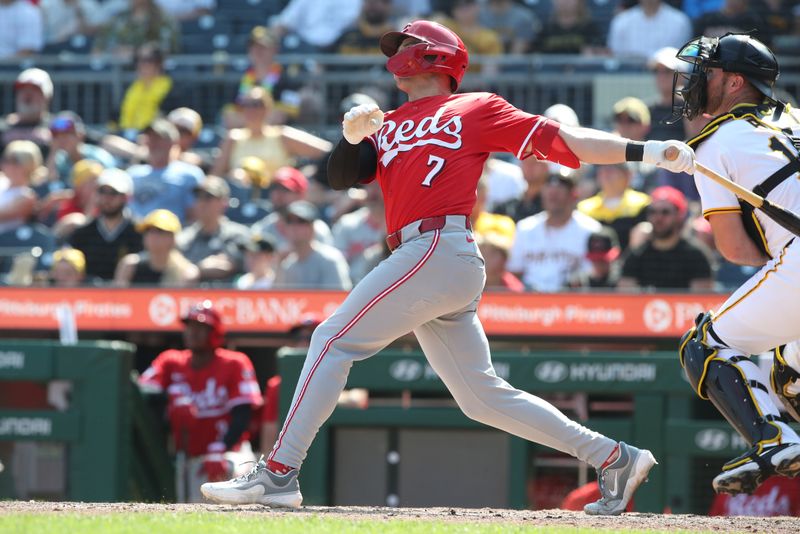 Aug 10, 2025; Pittsburgh, Pennsylvania, USA;  Cincinnati Reds first baseman Spencer Steer (7) hits a two run home run against the Pittsburgh Pirates during the eighth inning at PNC Park. Mandatory Credit: Charles LeClaire-Imagn Images