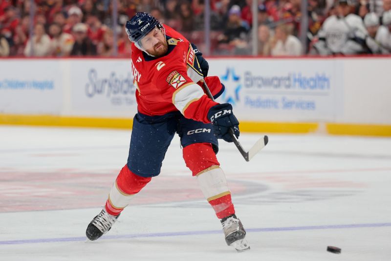 Dec 17, 2025; Sunrise, Florida, USA; Florida Panthers defenseman Jeff Petry (2) shoots the puck against the Los Angeles Kings during the second period at Amerant Bank Arena. Mandatory Credit: Sam Navarro-Imagn Images