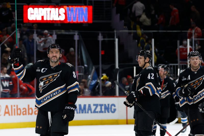 Jan 18, 2025; Washington, District of Columbia, USA; Washington Capitals left wing Alex Ovechkin (8) celebrates with teammates after their game against the Pittsburgh Penguins at Capital One Arena. Mandatory Credit: Geoff Burke-Imagn Images