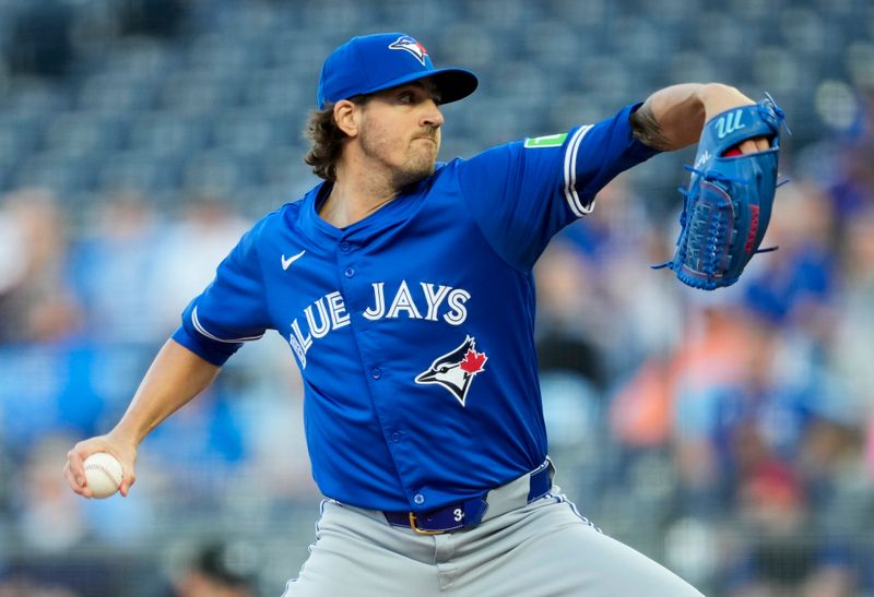 Apr 23, 2024; Kansas City, Missouri, USA; Toronto Blue Jays pitcher Kevin Gausman (34) pitches during the first inning against the Kansas City Royals at Kauffman Stadium. Mandatory Credit: Jay Biggerstaff-USA TODAY Sports