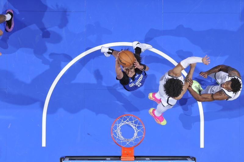 ORLANDO, FL - OCTOBER 25: Anthony Black #0 of the Orlando Magic dunks the ball during the game against the Brooklyn Nets on October 25, 2024 at Kia Center in Orlando, Florida. NOTE TO USER: User expressly acknowledges and agrees that, by downloading and or using this photograph, User is consenting to the terms and conditions of the Getty Images License Agreement. Mandatory Copyright Notice: Copyright 2024 NBAE (Photo by Fernando Medina/NBAE via Getty Images)