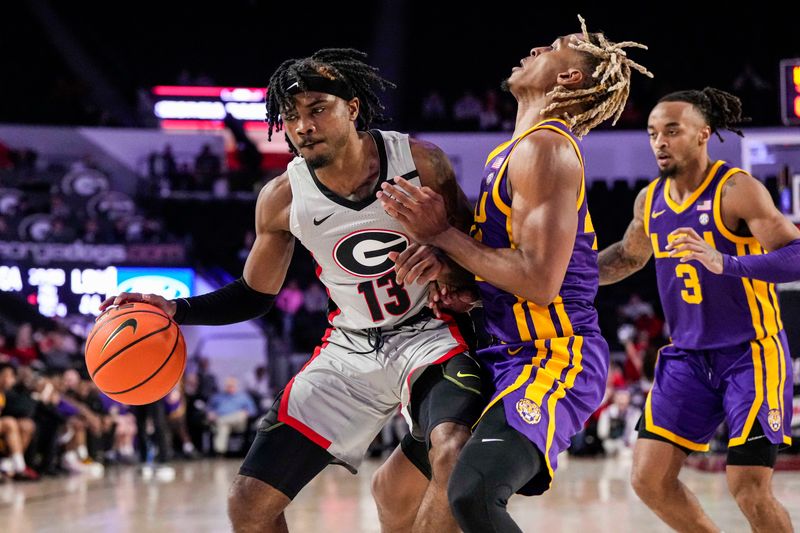 Feb 14, 2023; Athens, Georgia, USA; Georgia Bulldogs guard Mardrez McBride (13) and LSU Tigers guard Adam Miller (44) collide during the second half at Stegeman Coliseum. Mandatory Credit: Dale Zanine-USA TODAY Sports