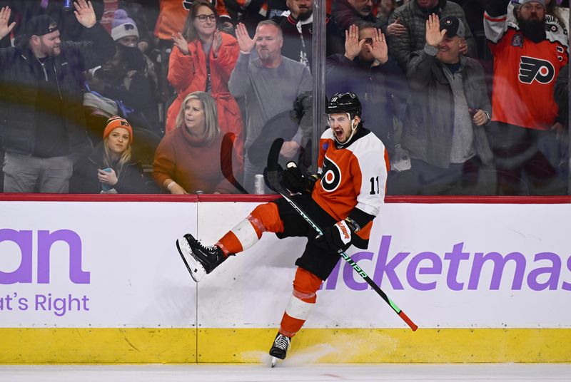 Nov 28, 2023; Philadelphia, Pennsylvania, USA; Philadelphia Flyers right wing Travis Konecny (11) celebrates after scoring a goal against the Carolina Hurricanes in the second period at Wells Fargo Center. Mandatory Credit: Kyle Ross-USA TODAY Sports