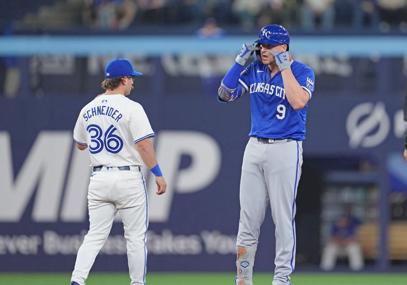 May 1, 2024; Toronto, Ontario, CAN; Kansas City Royals first baseman Vinnie Pasquantino (9) celebrates hitting a double against the Toronto Blue Jays during the sixth inning at Rogers Centre. Mandatory Credit: Nick Turchiaro-USA TODAY Sports