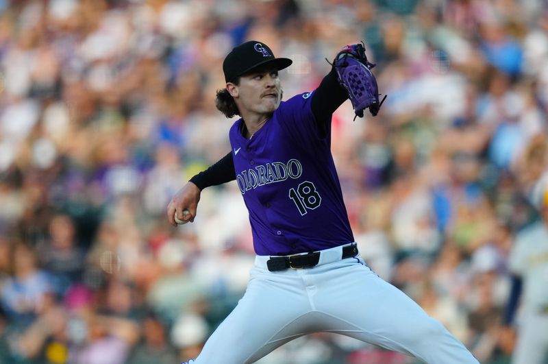 Jul 2, 2024; Denver, Colorado, USA; Colorado Rockies starting pitcher Ryan Feltner (18) in the first inning against the Milwaukee Brewers at Coors Field. Mandatory Credit: Ron Chenoy-USA TODAY Sports