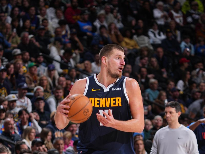 DENVER, CO - NOVEMBER 6: Nikola Jokic #15 of the Denver Nuggets dribbles the ball during the game against the Oklahoma City Thunder on November 6, 2024 at Ball Arena in Denver, Colorado. NOTE TO USER: User expressly acknowledges and agrees that, by downloading and/or using this Photograph, user is consenting to the terms and conditions of the Getty Images License Agreement. Mandatory Copyright Notice: Copyright 2024 NBAE (Photo by Garrett Ellwood/NBAE via Getty Images)