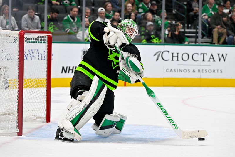 Jan 10, 2024; Dallas, Texas, USA; Dallas Stars goaltender Scott Wedgewood (41) passes the puck during the first period against the Minnesota Wild at the American Airlines Center. Mandatory Credit: Jerome Miron-USA TODAY Sports