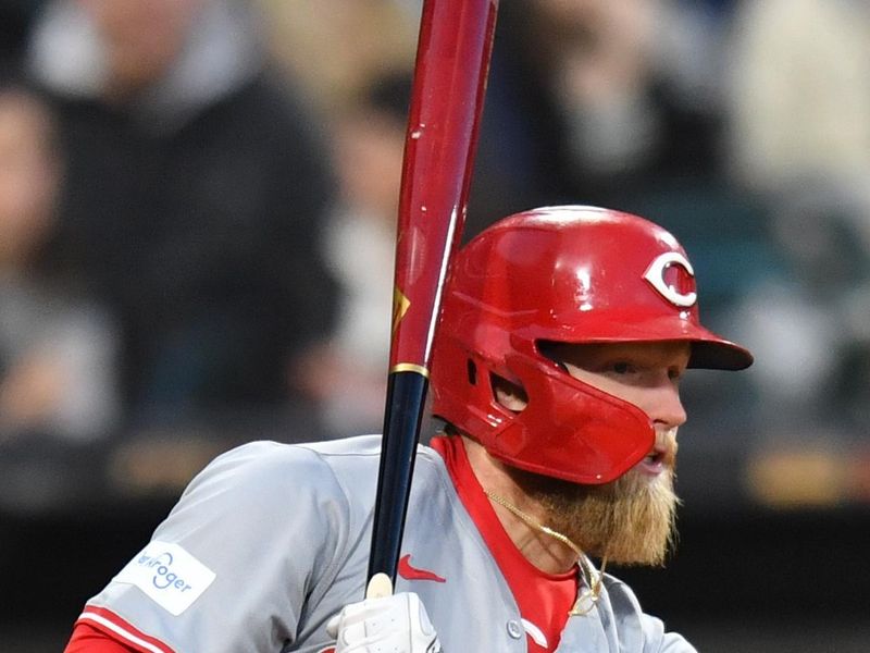 Apr 12, 2024; Chicago, Illinois, USA; Cincinnati Reds left fielder Spencer Steer (7) hits an RBI single during the third inning against the Chicago White Sox at Guaranteed Rate Field. Mandatory Credit: Patrick Gorski-USA TODAY Sports