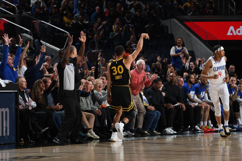 SAN FRANCISCO, CA - FEBRUARY 14: Stephen Curry #30 of the Golden State Warriors reacts to a play during the game against the LA Clippers on FEBRUARY 14, 2024 at Chase Center in San Francisco, California. NOTE TO USER: User expressly acknowledges and agrees that, by downloading and or using this photograph, user is consenting to the terms and conditions of Getty Images License Agreement. Mandatory Copyright Notice: Copyright 2024 NBAE (Photo by Noah Graham/NBAE via Getty Images)