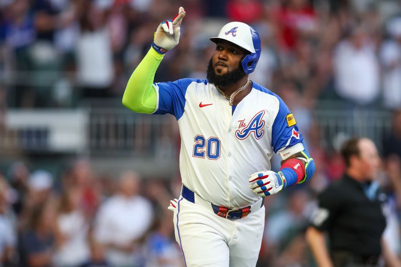 Aug 3, 2024; Atlanta, Georgia, USA; Atlanta Braves designated hitter Marcell Ozuna (20) reacts after a home run against the Miami Marlins in the third inning at Truist Park. Mandatory Credit: Brett Davis-USA TODAY Sports
