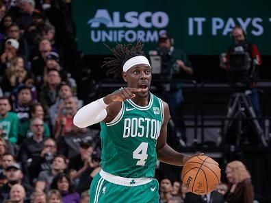 SACRAMENTO, CA - DECEMBER 20:  Jrue Holiday #4 of the Boston Celtics handles the ball during the game  on December 20, 2023 at Golden 1 Center in Sacramento, California. NOTE TO USER: User expressly acknowledges and agrees that, by downloading and or using this Photograph, user is consenting to the terms and conditions of the Getty Images License Agreement. Mandatory Copyright Notice: Copyright 2023 NBAE (Photo by Rocky Widner/NBAE via Getty Images)