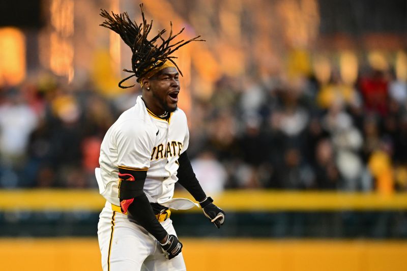 Apr 6, 2024; Pittsburgh, Pennsylvania, USA; Pittsburgh Pirates shortstop Oneil Cruz (15) celebrates after hitting a game winning walk off single during the eleventh inning against the Baltimore Orioles at PNC Park. Mandatory Credit: David Dermer-USA TODAY Sports