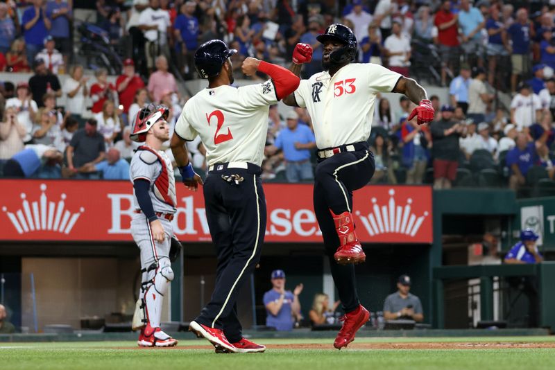 Sep 2, 2023; Arlington, Texas, USA; Texas Rangers right fielder Adolis Garcia (53) celebrates a hone run with second baseman Marcus Semien (2) after hitting a two run home run against the Minnesota Twins in the first inning at Globe Life Field. Mandatory Credit: Tim Heitman-USA TODAY Sports