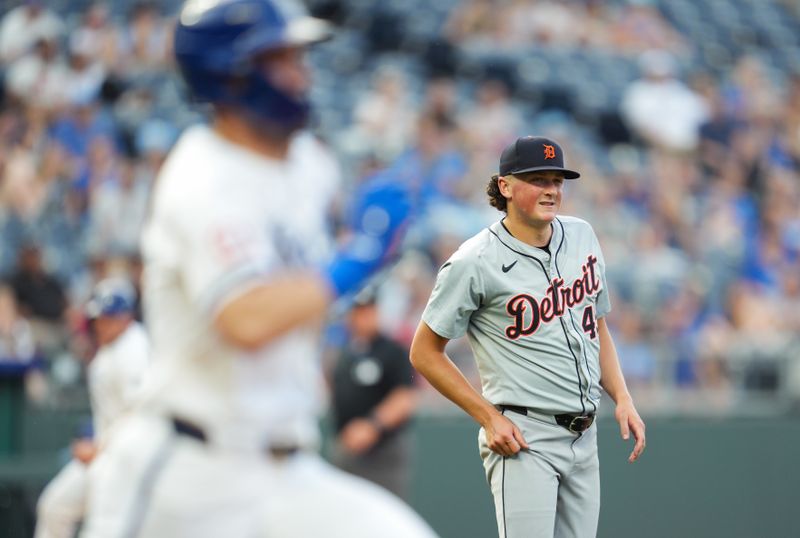 May 20, 2024; Kansas City, Missouri, USA; Detroit Tigers starting pitcher Reese Olson (45) reacts after being hit by a line drive off the bat of Kansas City Royals second baseman Michael Massey (19) during the third inning at Kauffman Stadium. Mandatory Credit: Jay Biggerstaff-USA TODAY Sports