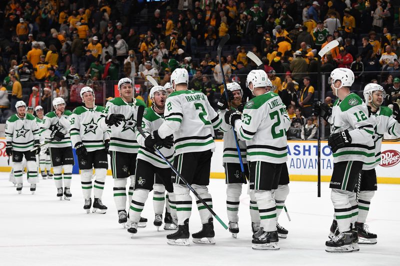 Dec 23, 2023; Nashville, Tennessee, USA; Dallas Stars defenseman Jani Hakanpaa (2) celebrates with teammates after scoring the game-winning goal late in the third period to beat the Nashville Predators at Bridgestone Arena. Mandatory Credit: Christopher Hanewinckel-USA TODAY Sports