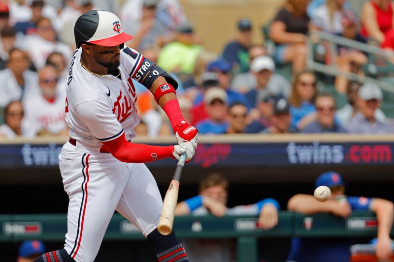 Sep 9, 2023; Minneapolis, Minnesota, USA; Minnesota Twins center fielder Willi Castro (50) hits a double against the New York Mets in the second inning at Target Field. Mandatory Credit: Bruce Kluckhohn-USA TODAY Sports