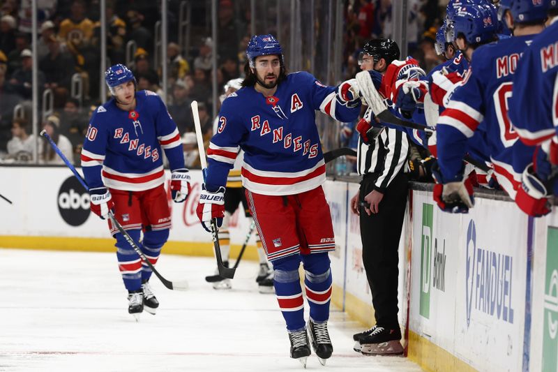 Jan 10, 2026; Boston, Massachusetts, USA; New York Rangers center Mika Zibanejad (93) is congratulated at the bench after scoring against the Boston Bruins during the first period at TD Garden. Mandatory Credit: Winslow Townson-Imagn Images